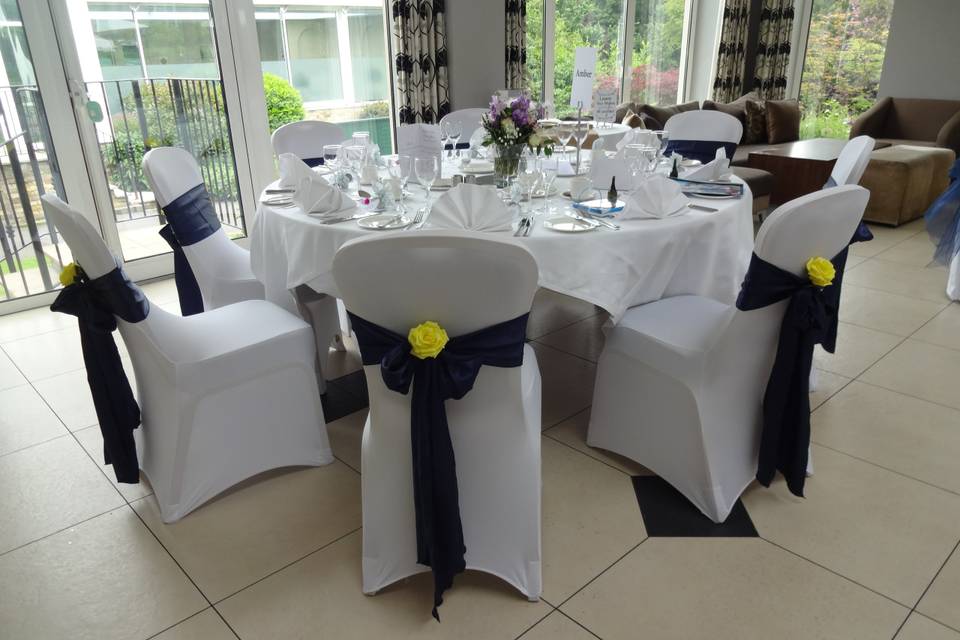 Navy and yellow venue styling