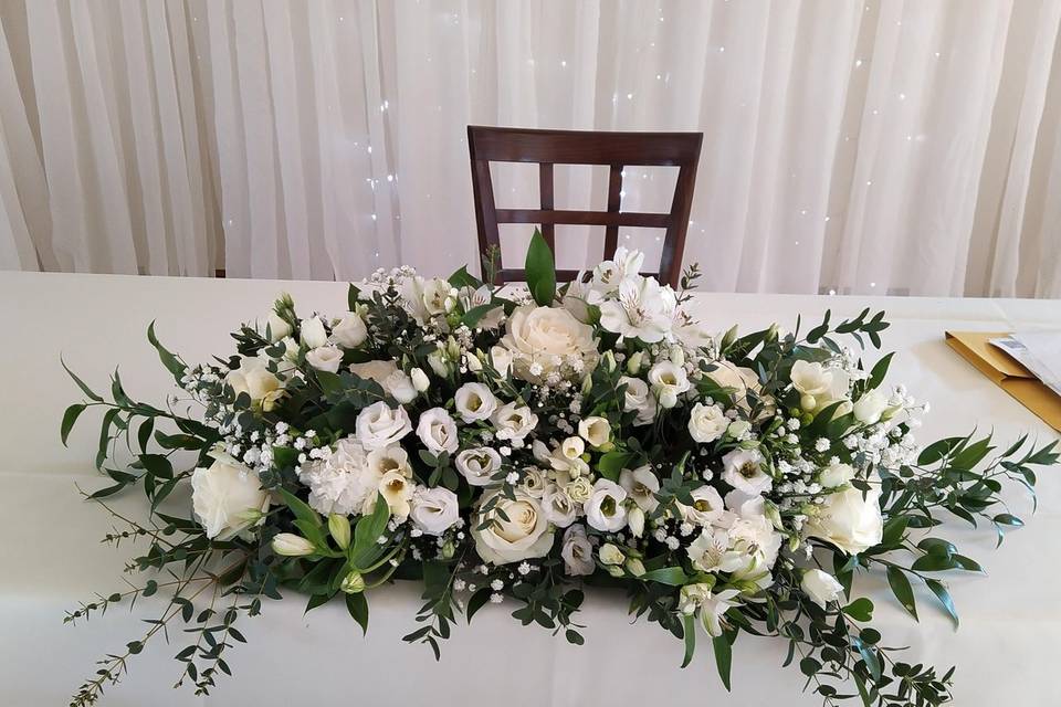 Ivory ceremony flowers