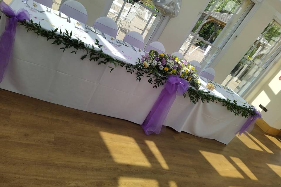 Red and ivory top table flower