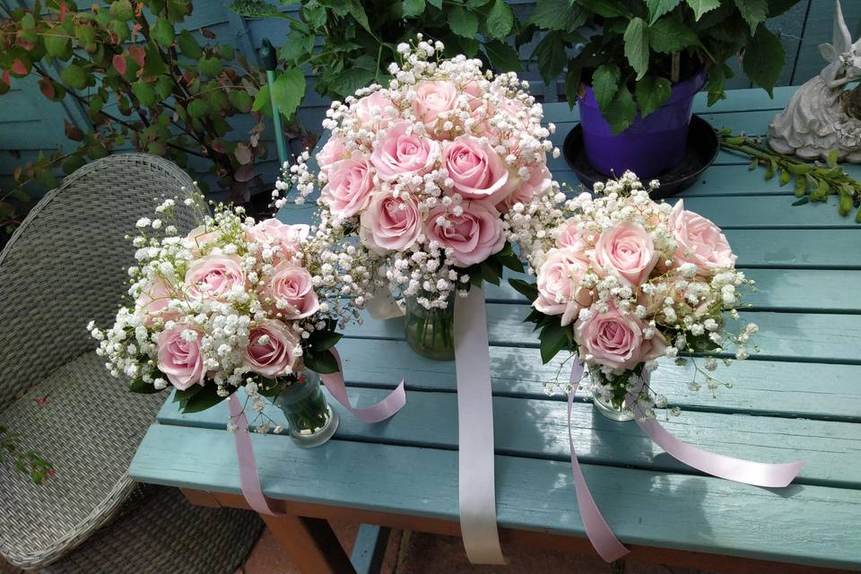 Pink rose and gyp bouquets