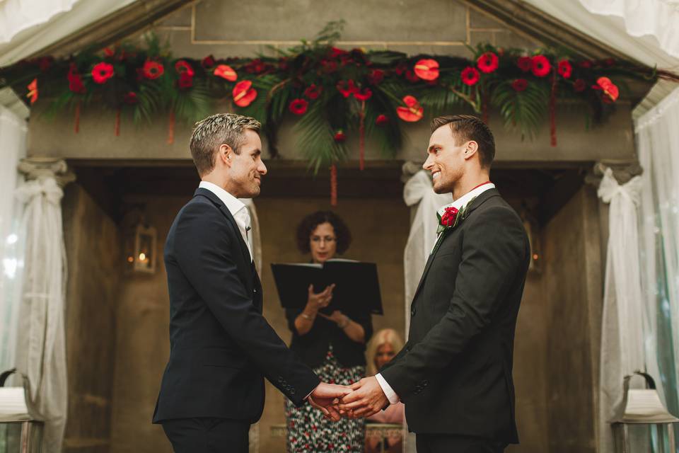Grooms exchanging vows