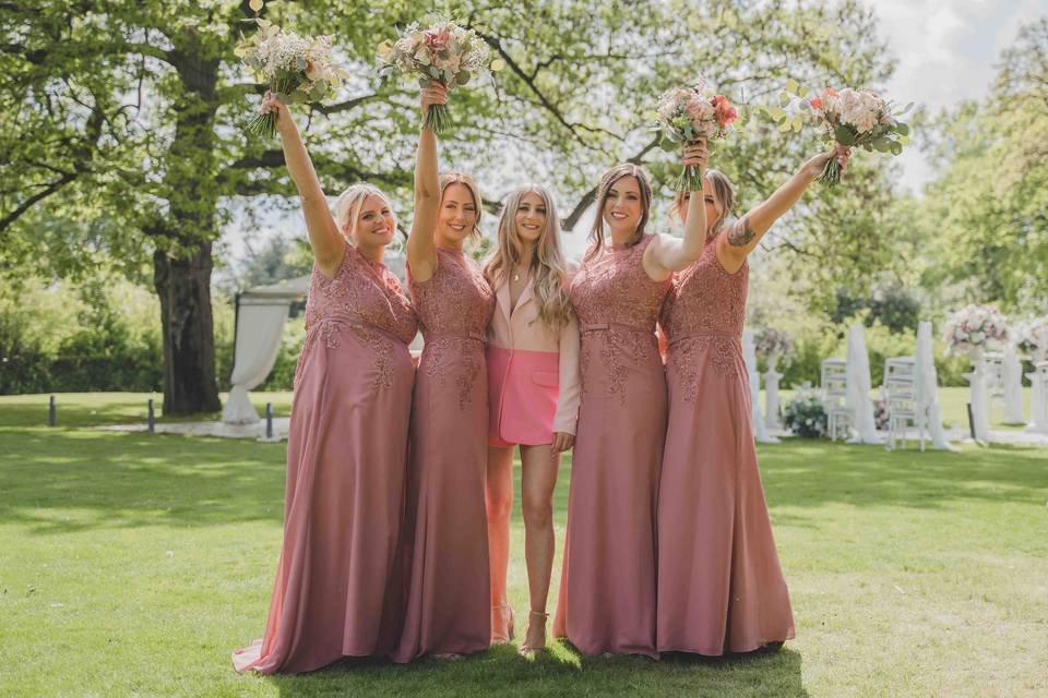 Bridesmaids holding flowers