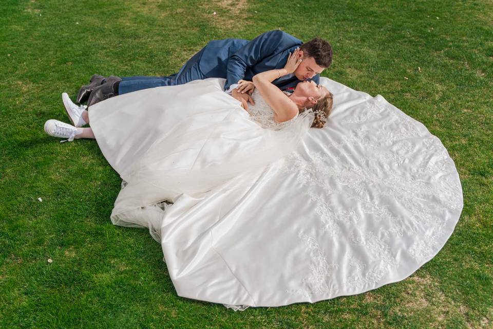 Couple laying in the grass