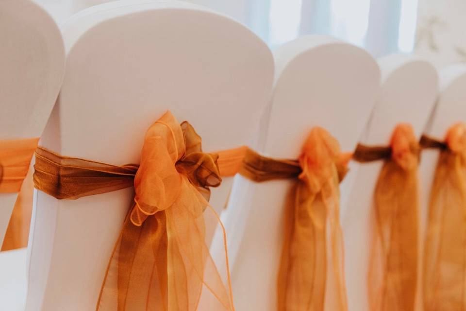 Orange and gold organza sashes