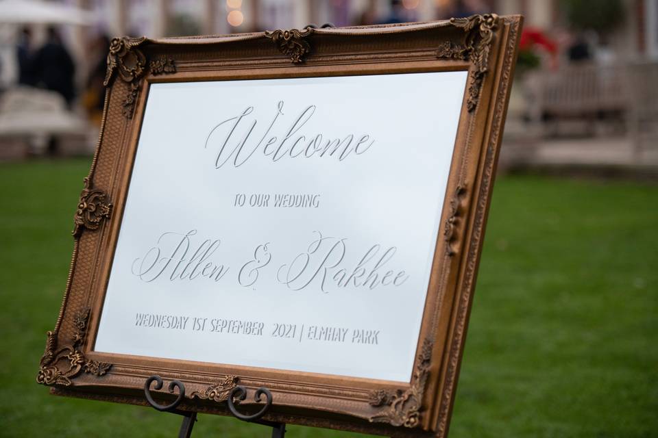 Mirrored welcome sign