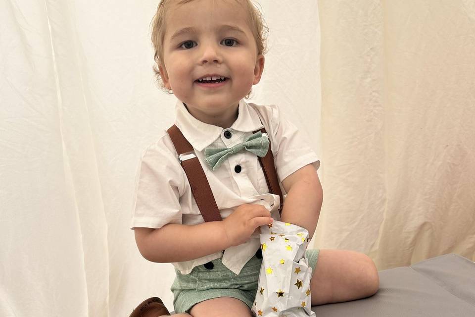 Happy boy with his party bag