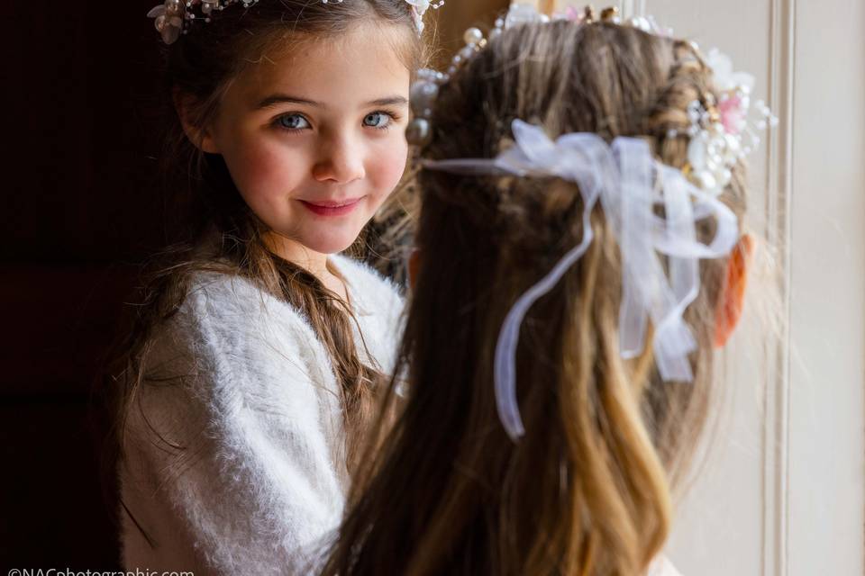 Flower girls by window