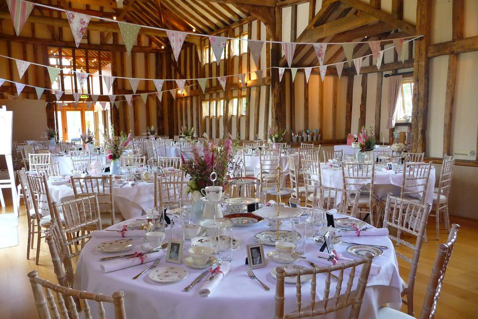 Round tables set for teh wedding breakfast.