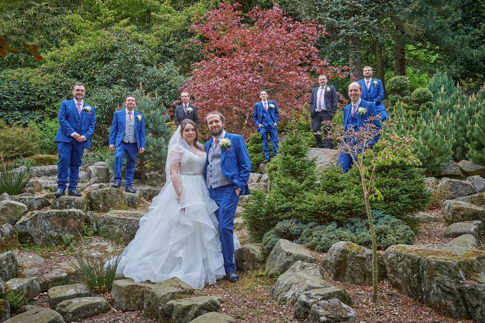 Newlyweds with groomsmen