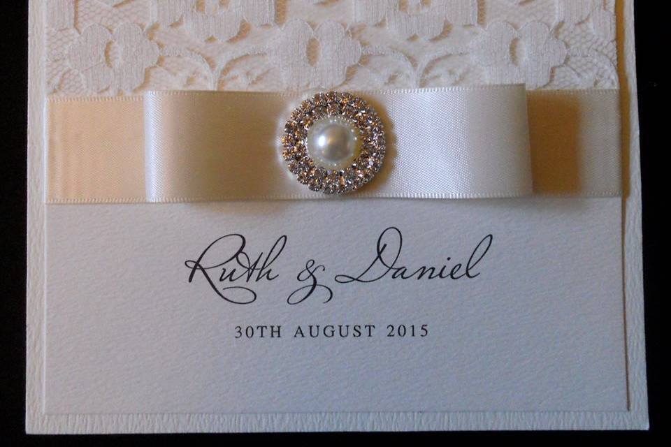 Pearl brooch lace invite