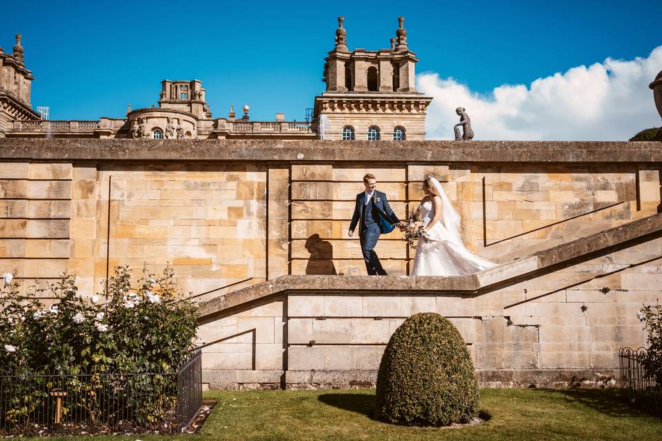 Newlyweds walking together - Vicky Lewis Photography