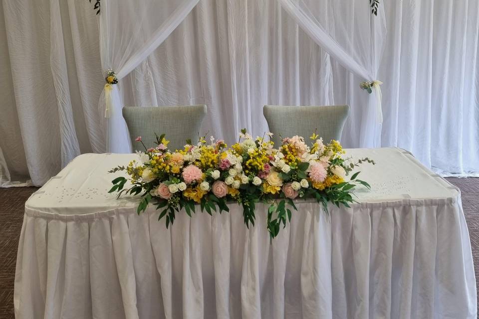 Ceremony table and archway