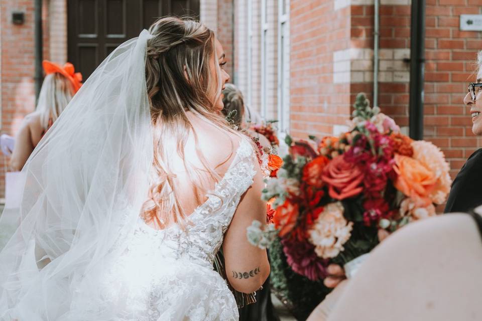 Bride and entourage arrive