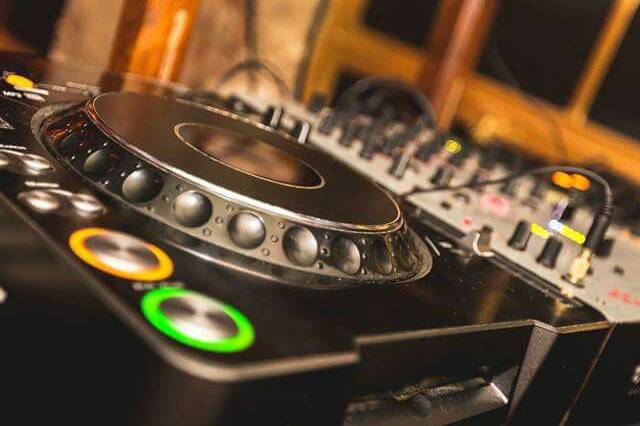 A pair of a CDJs and a mixer