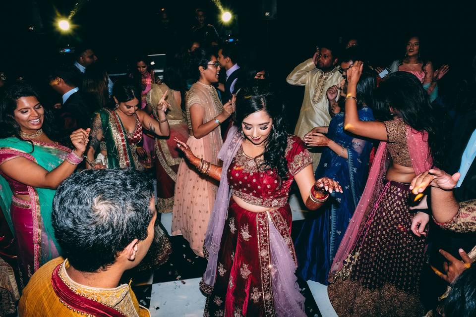 Asian bride on dance floor
