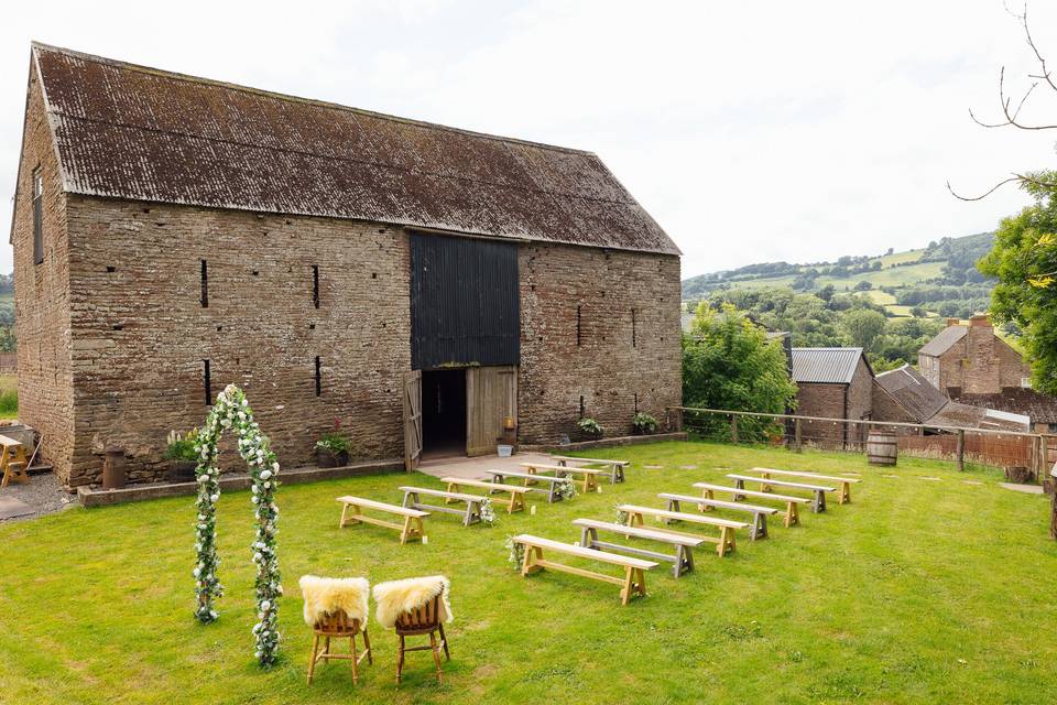 Ceremony on the barn lawn