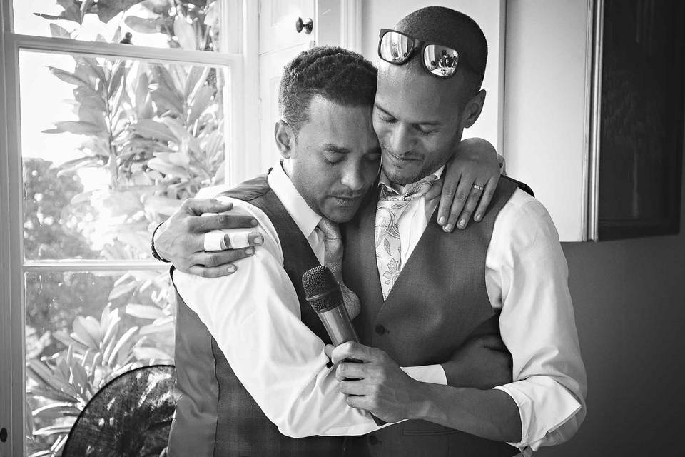 Groom Places Ring on Finger of His Bride