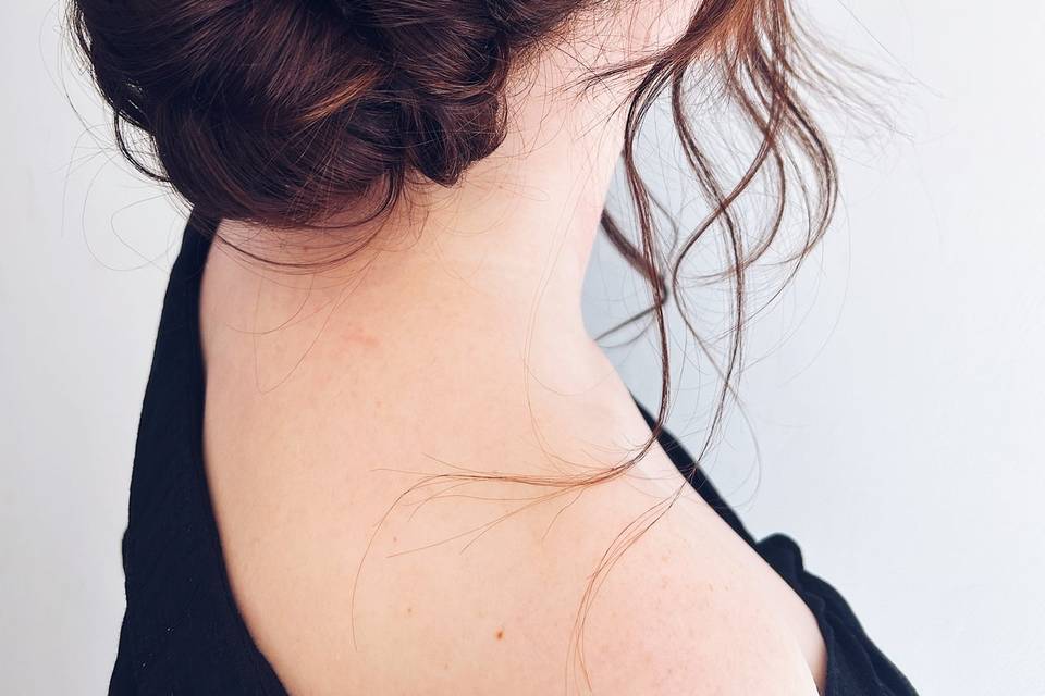 Low romantic bun with pearls