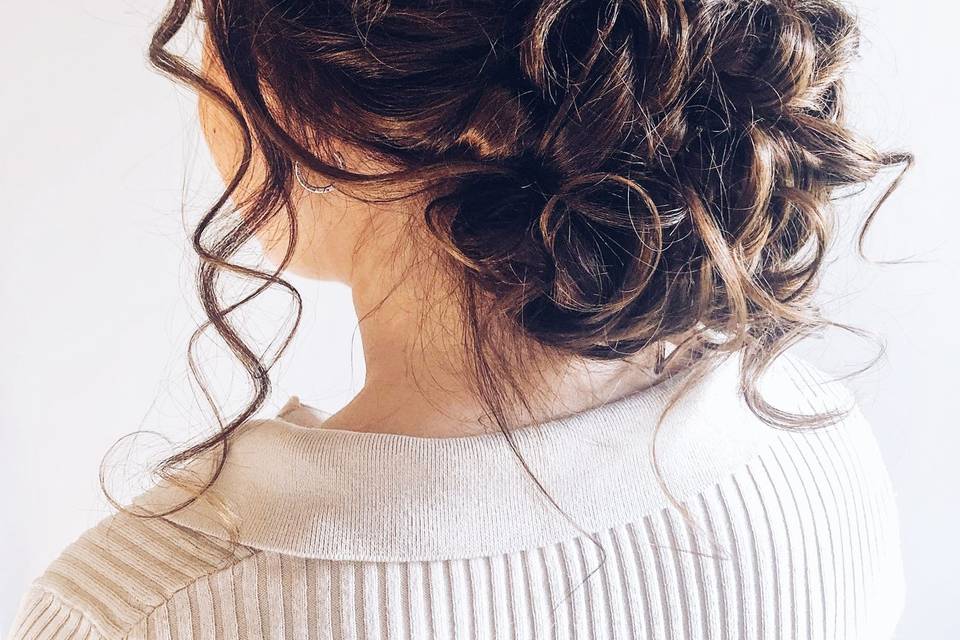 Messy bun with loose pieces