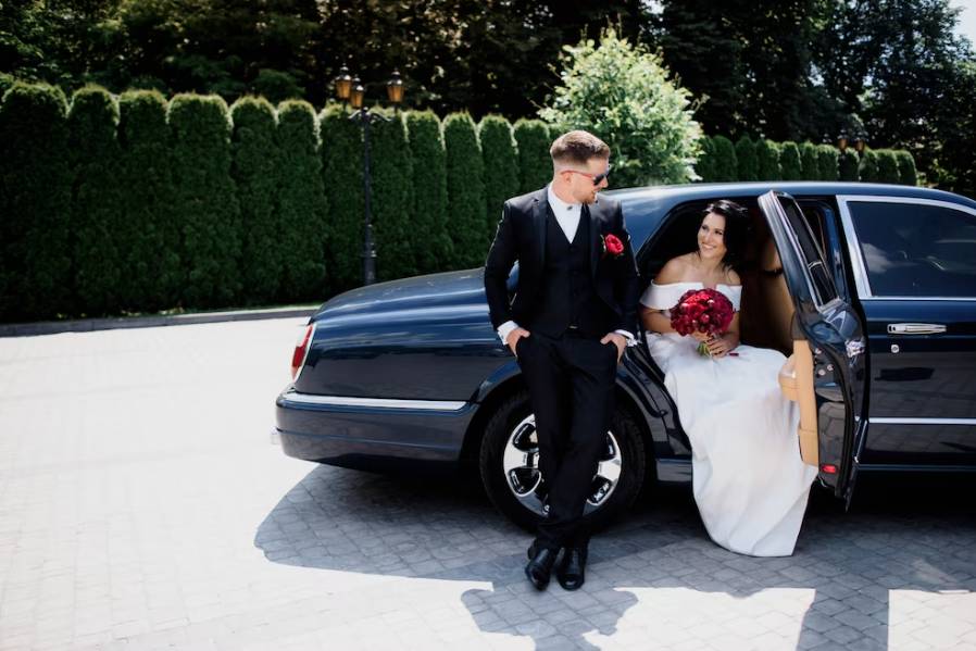 Couple getting out of taxi