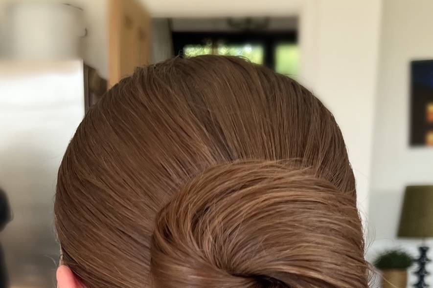 April’s bridal sleek bun