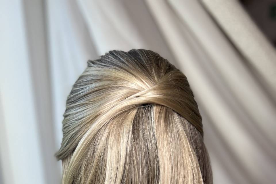 Glossy loose waves half up