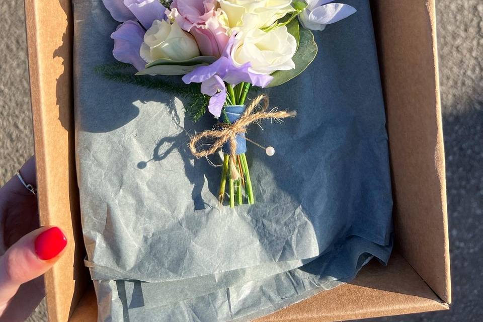 Blue sweet pea boutonnière