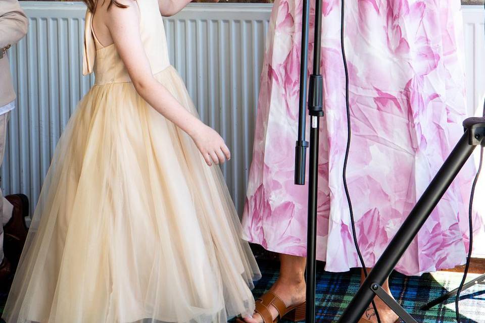 Singing with the flower girl.