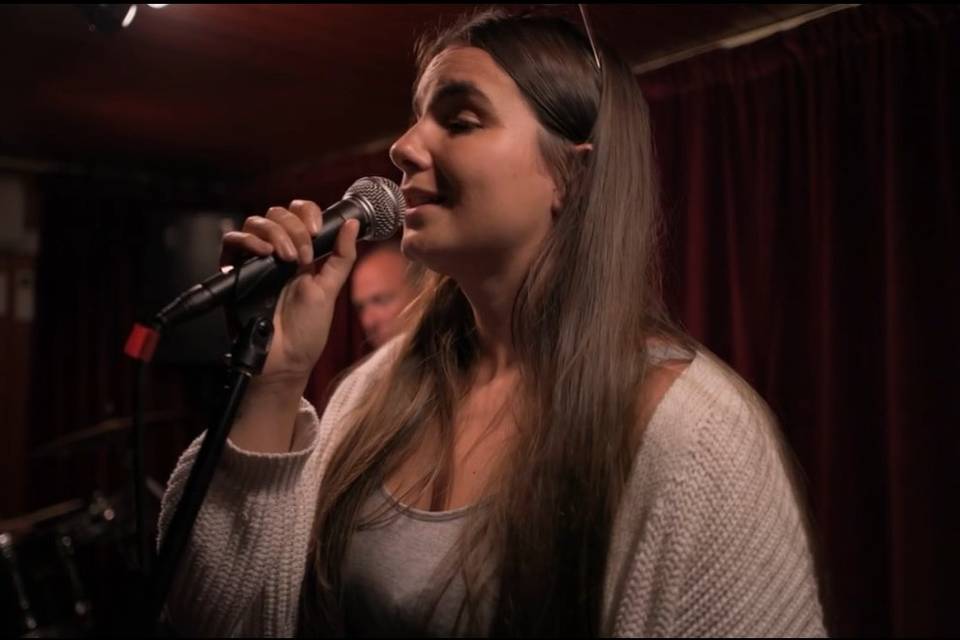 Singing with a band