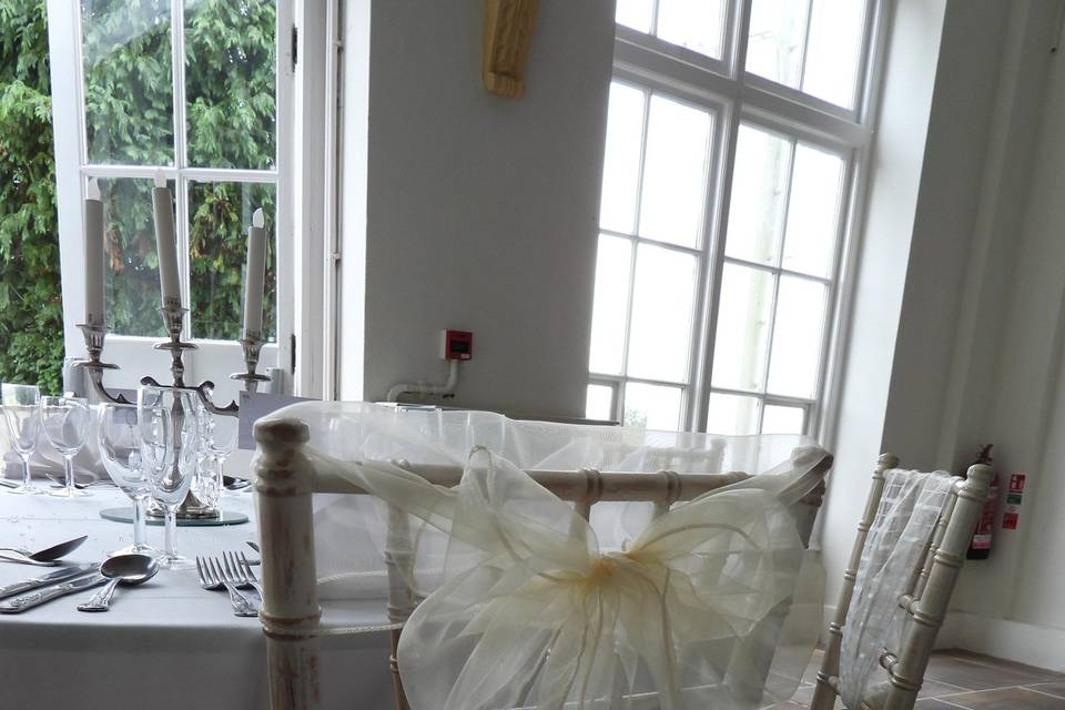 Ivory chair sash top cover bow