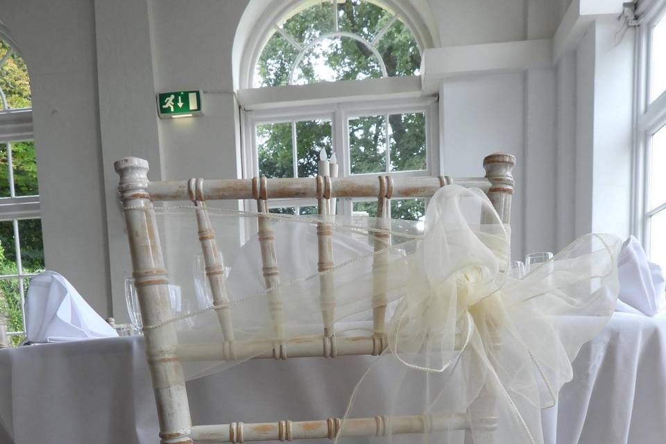 Ivory chair sash side bow