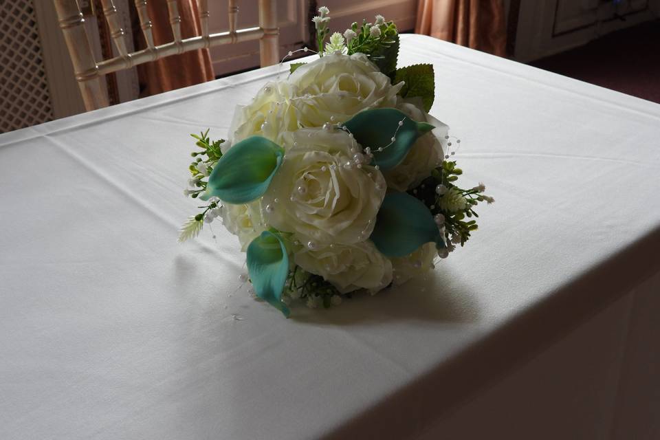 Blue lily and rose bouquet