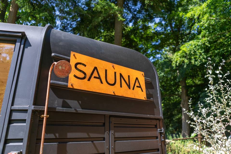 Mobile sauna side branding sign