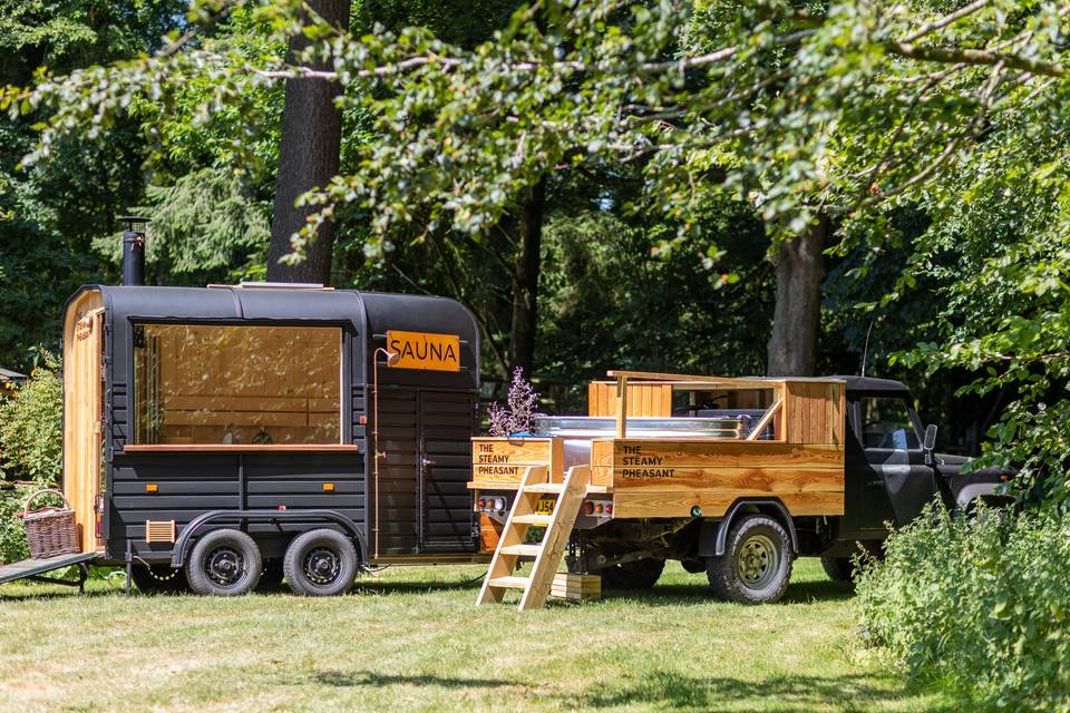 Mobile sauna trailer in woods