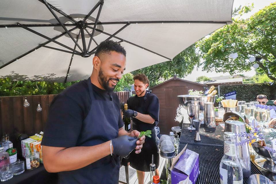 Bartender mixing drinks