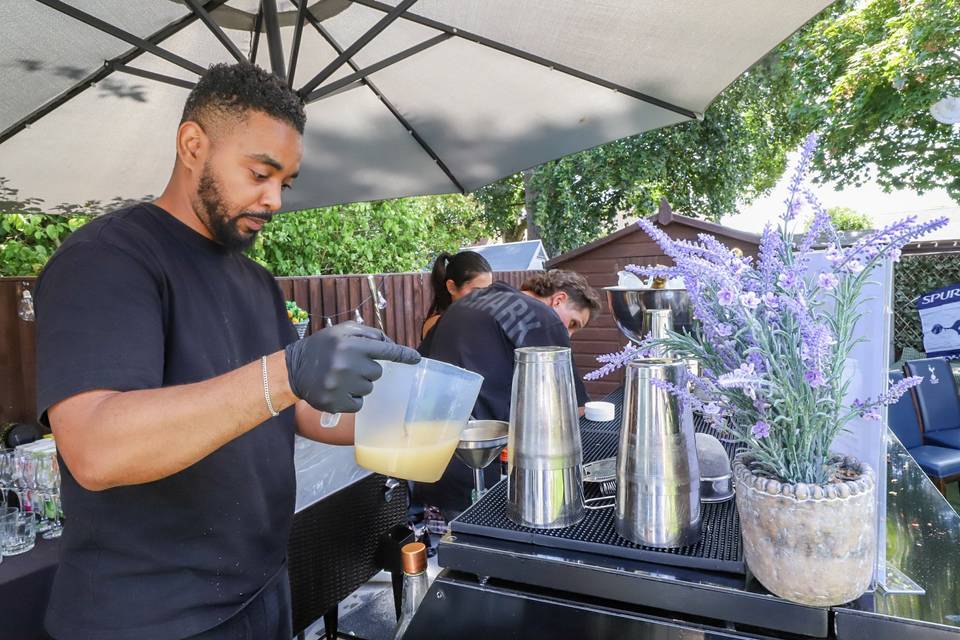 Bartender preparing fresh cocktail