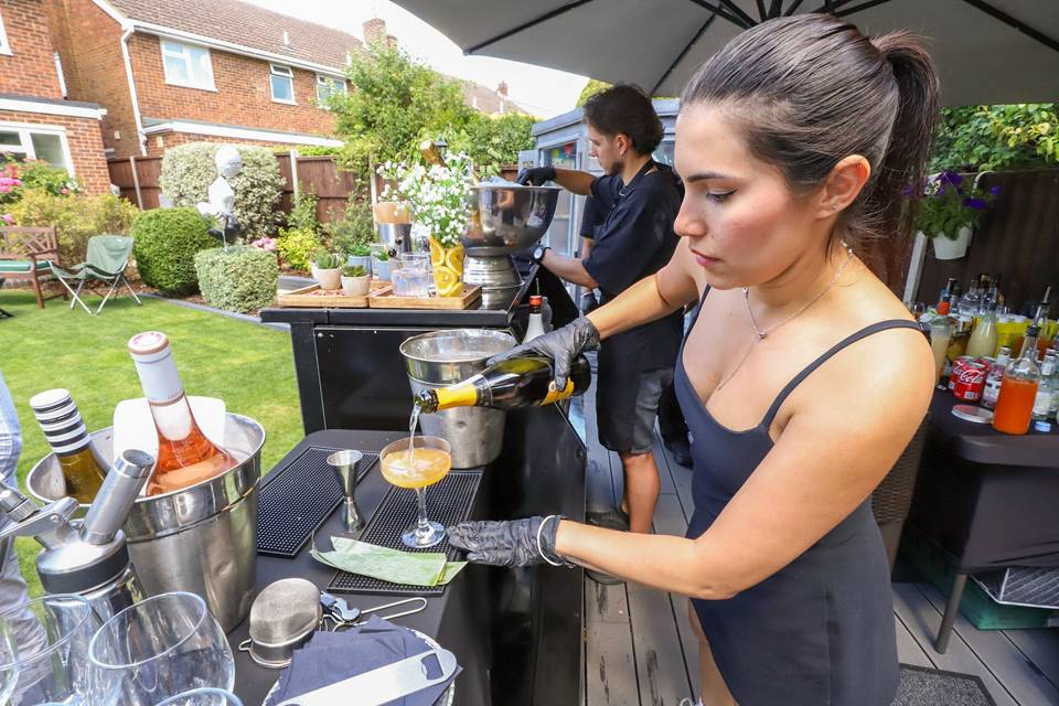 Bartender stirring the drink