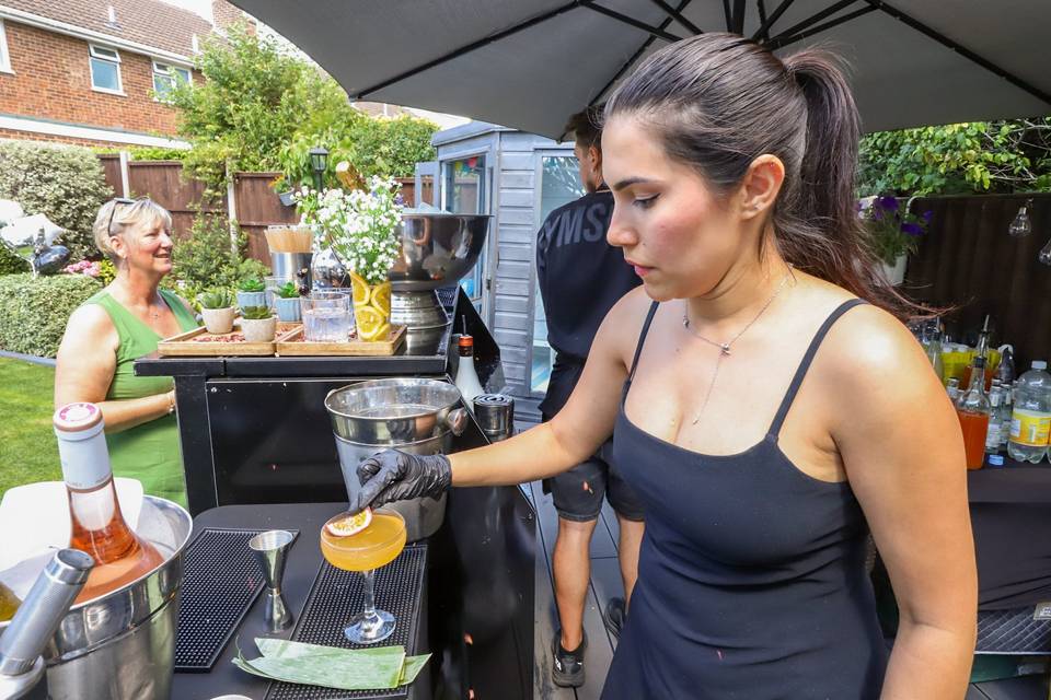 Pouring cocktail from bottle