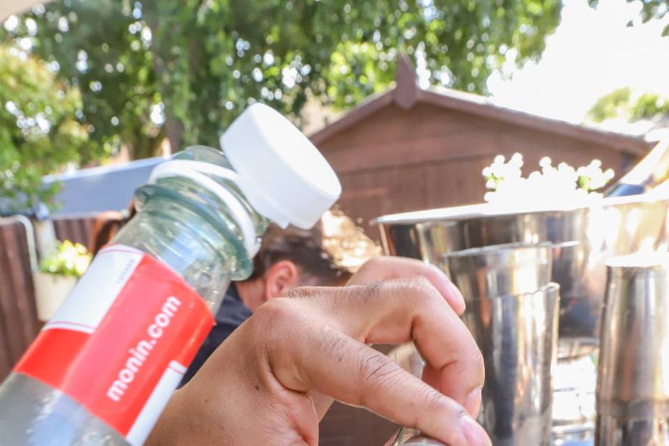 Pouring ingredients into shaker