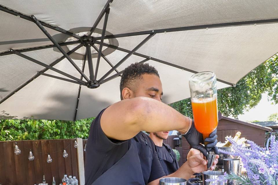 Shaking a cocktail vigorously