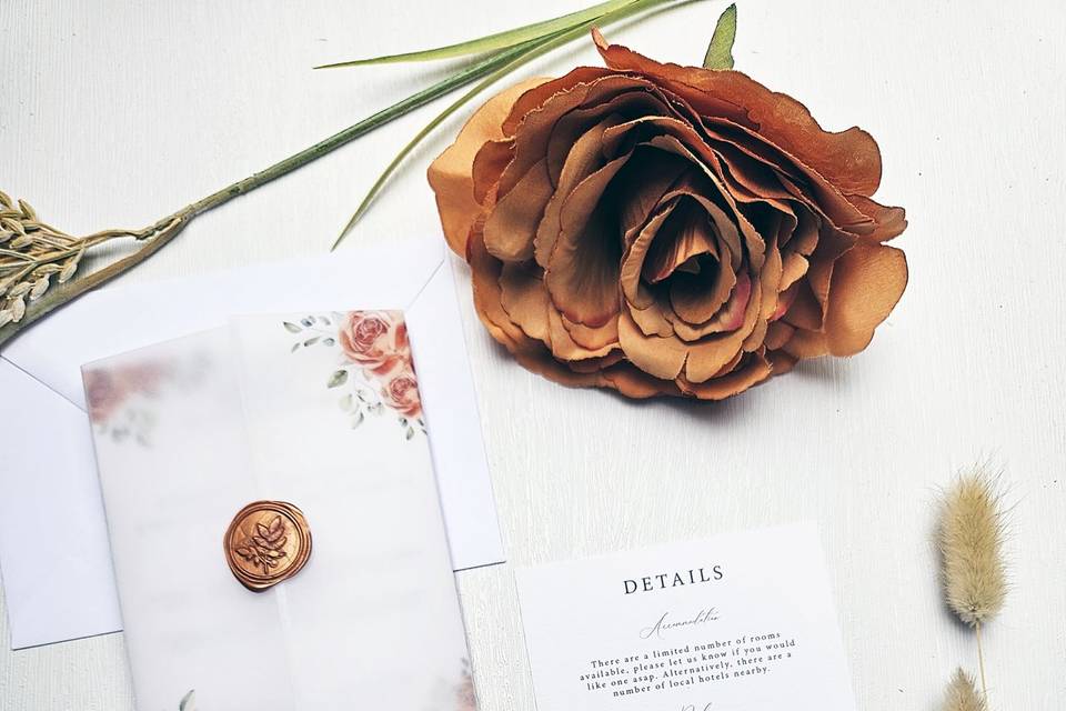 Copper floral vellum invites