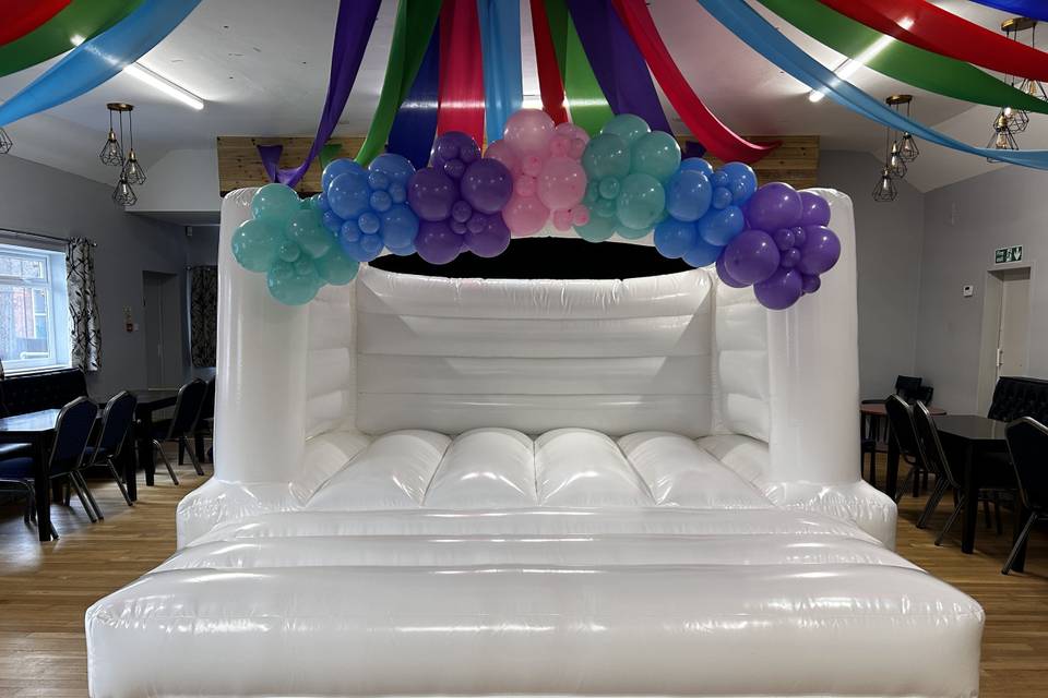 Bouncy castle with balloons