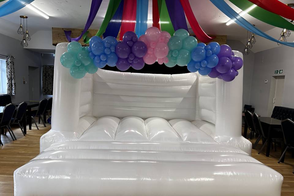 Bouncy castle with balloons