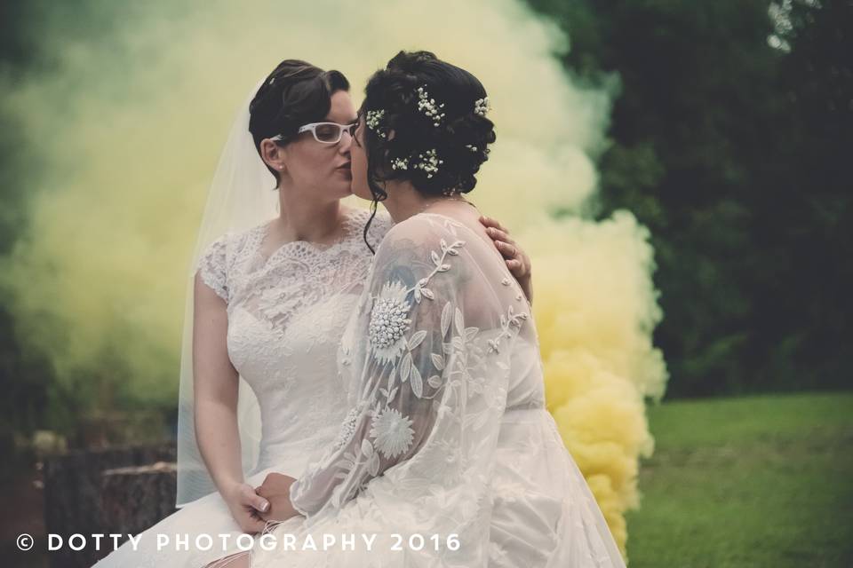 Couple holding hands and dancing - Dotty Photography