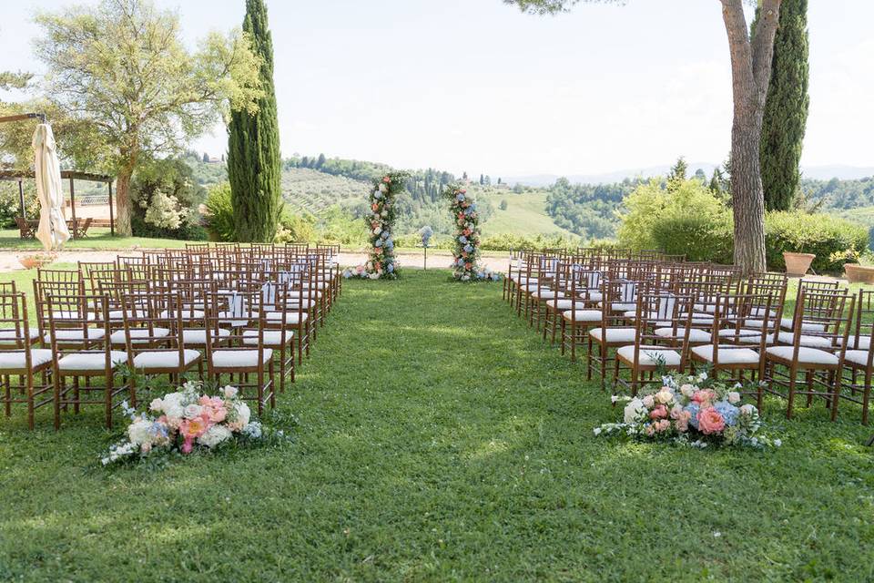 Flower arch + aisle ends