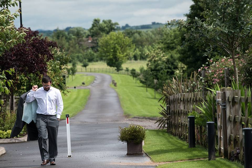 Groom arriving at Mythe Barn