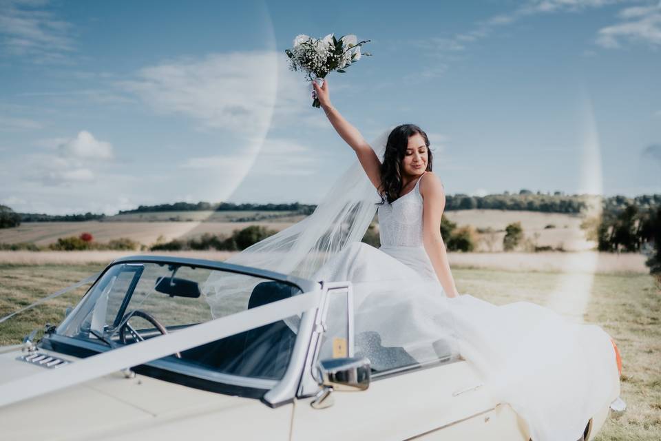 Bride in the wedding car