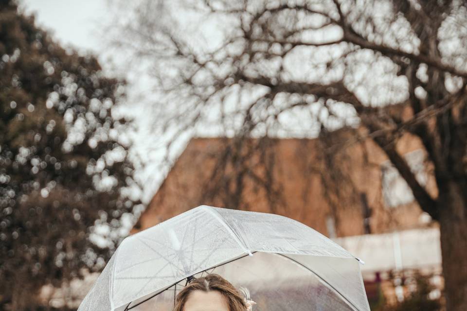 Bride under the umbrella