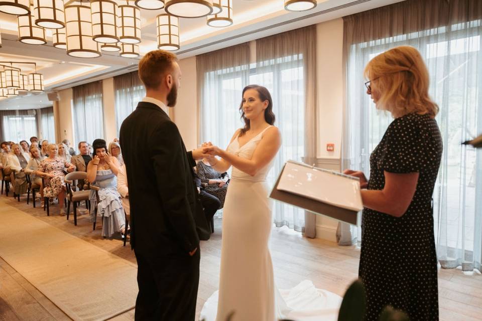 Steve and Alex exchanging ring