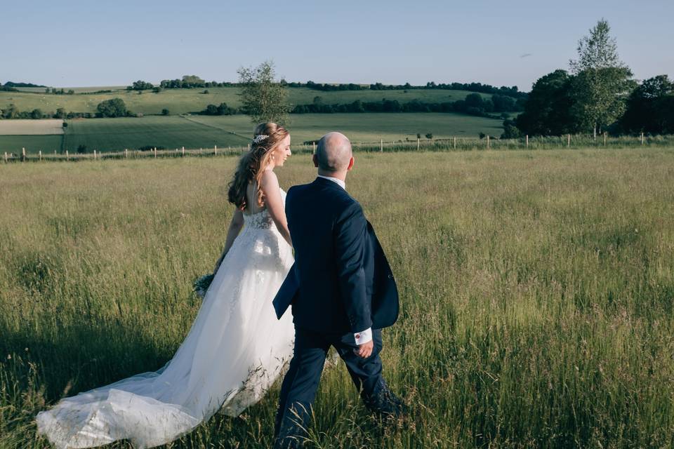 Walking side by side in field